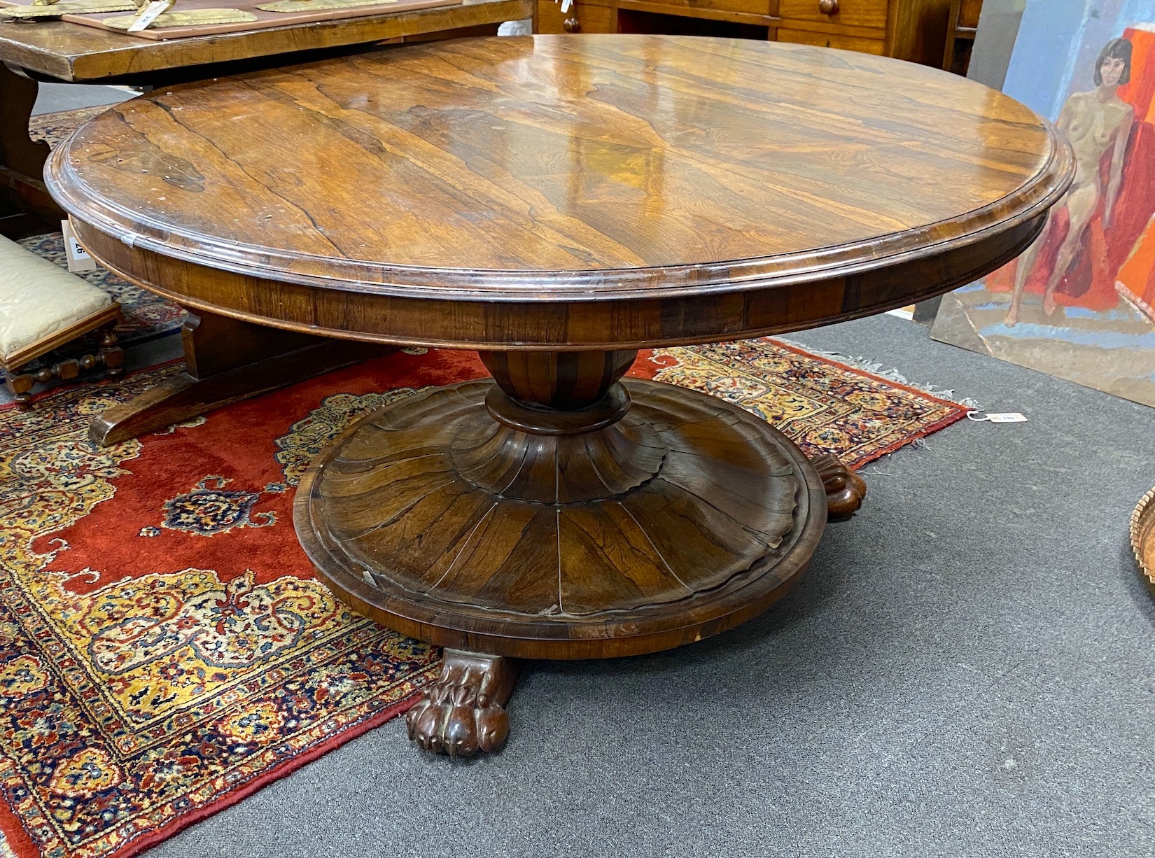 An early Victorian circular rosewood tilt top breakfast table, diameter 130cm, height 69cm